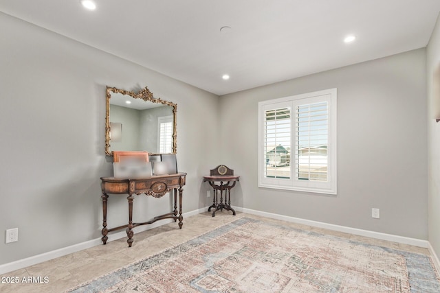 interior space featuring recessed lighting, baseboards, and tile patterned flooring