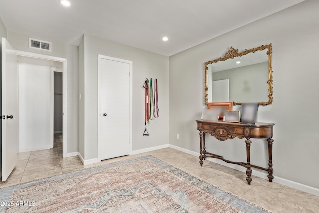 interior space featuring recessed lighting, visible vents, and baseboards