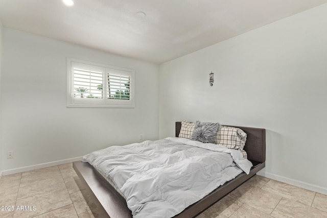 bedroom with baseboards