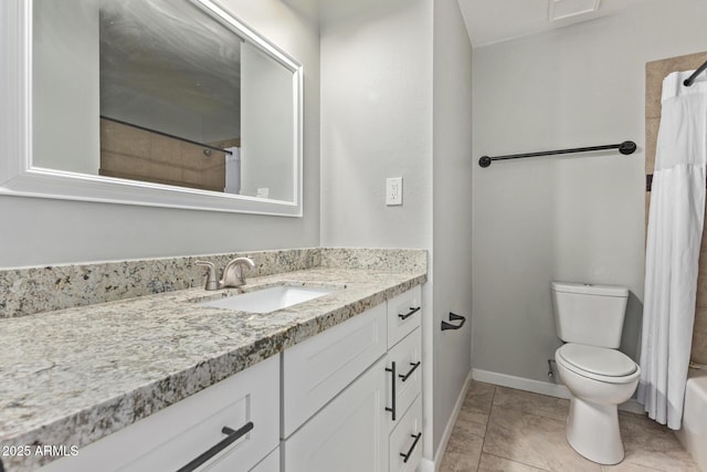 full bathroom with tile patterned flooring, toilet, vanity, and baseboards