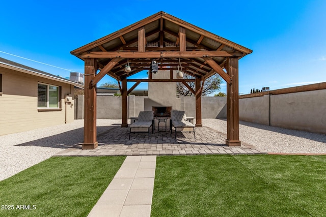 view of patio / terrace with a gazebo and a fenced backyard