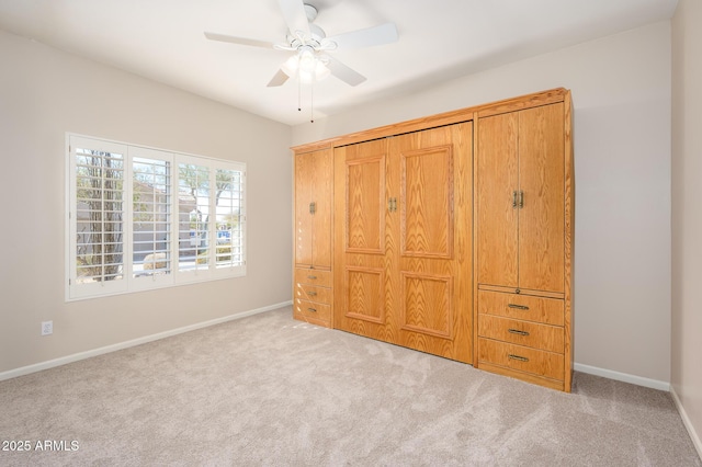 unfurnished bedroom featuring light colored carpet