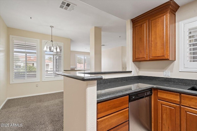 kitchen featuring visible vents, brown cabinets, dark countertops, and dishwasher