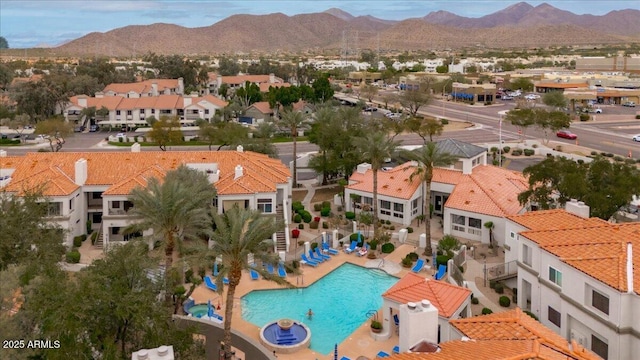 drone / aerial view with a residential view and a mountain view