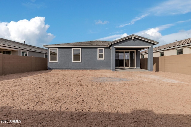 rear view of house with a patio area