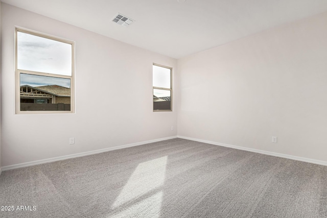 view of carpeted spare room