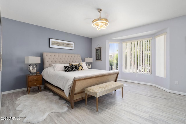 bedroom with light hardwood / wood-style flooring