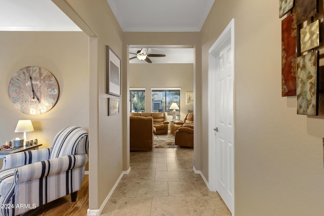 hall featuring ornamental molding