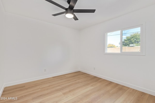 unfurnished room featuring ceiling fan and light hardwood / wood-style flooring