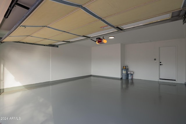 garage featuring a garage door opener