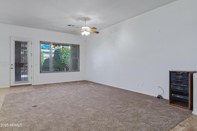 11413 S Coolwater Dr, Goodyear, AZ 85338 - unfurnished living room with visible vents, carpet flooring, attic access, and a ceiling fan
