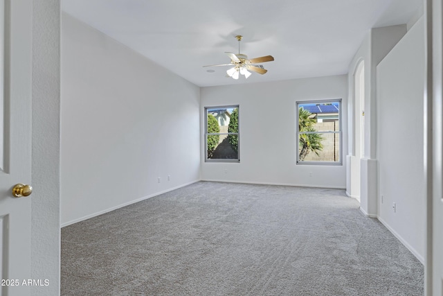 11413 S Coolwater Dr, Goodyear, AZ 85338 - carpeted spare room with a ceiling fan and baseboards