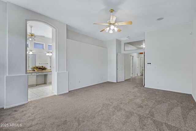11413 S Coolwater Dr, Goodyear, AZ 85338 - unfurnished room with a ceiling fan, baseboards, and light carpet