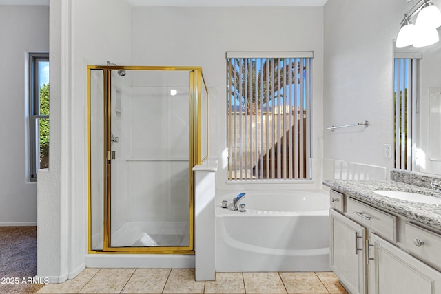 11413 S Coolwater Dr, Goodyear, AZ 85338 - bathroom with tile patterned flooring, a shower stall, vanity, and a bath