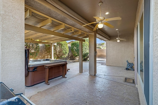 11413 S Coolwater Dr, Goodyear, AZ 85338 - view of patio / terrace with a hot tub, a ceiling fan, and fence