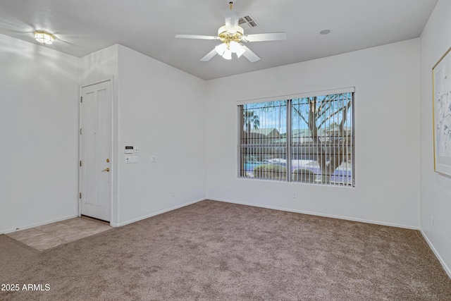 11413 S Coolwater Dr, Goodyear, AZ 85338 - carpeted empty room with visible vents, a ceiling fan, and baseboards