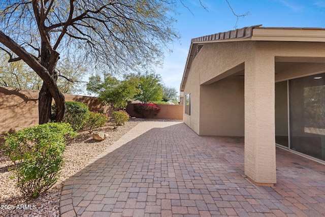 view of patio with a fenced backyard