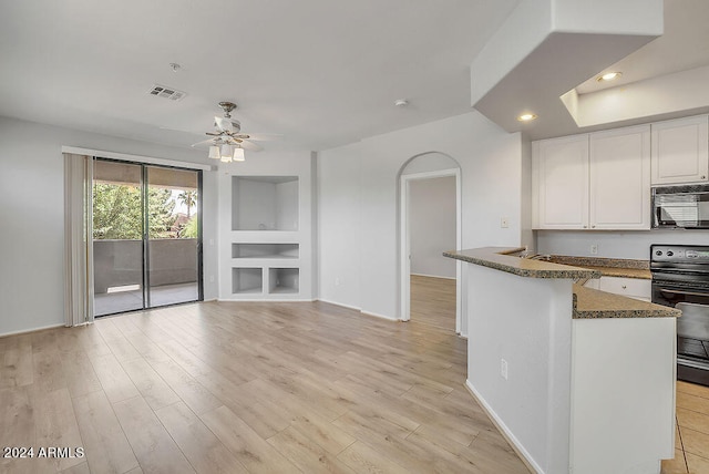 kitchen featuring white cabinets, kitchen peninsula, light hardwood / wood-style flooring, black appliances, and ceiling fan