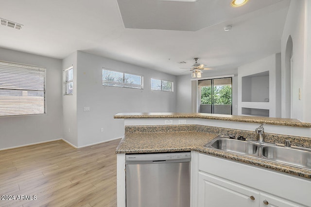 kitchen with dishwasher, sink, white cabinetry, light hardwood / wood-style flooring, and ceiling fan