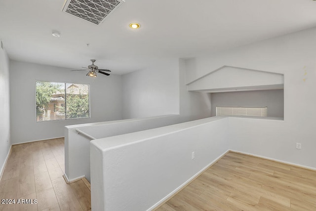 hallway featuring light hardwood / wood-style floors