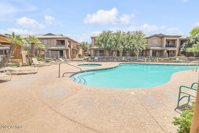 view of pool featuring a patio area