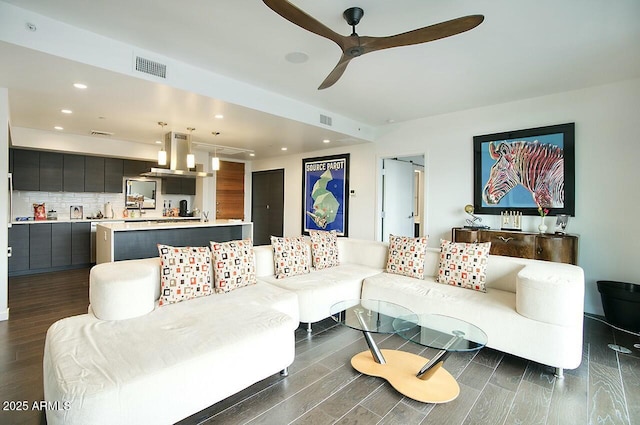 living room with ceiling fan