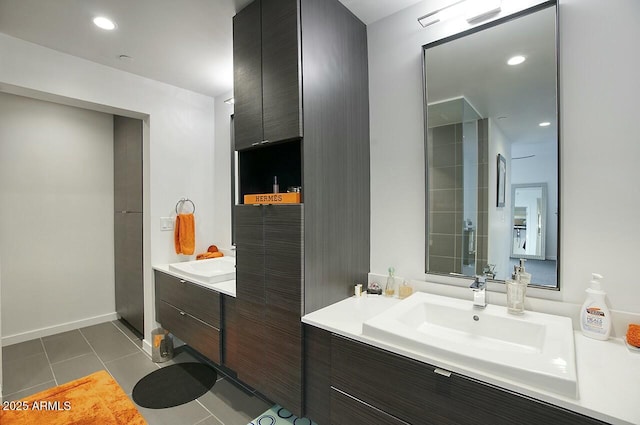 bathroom with tile patterned flooring and vanity