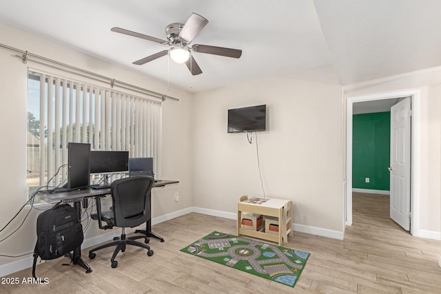 home office with ceiling fan and light wood-type flooring