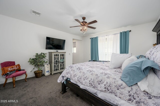 1221 E Paseo Way, Phoenix, AZ 85042 - carpeted bedroom featuring baseboards and ceiling fan