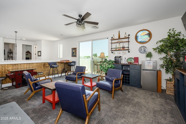 1221 E Paseo Way, Phoenix, AZ 85042 - carpeted living room with a ceiling fan