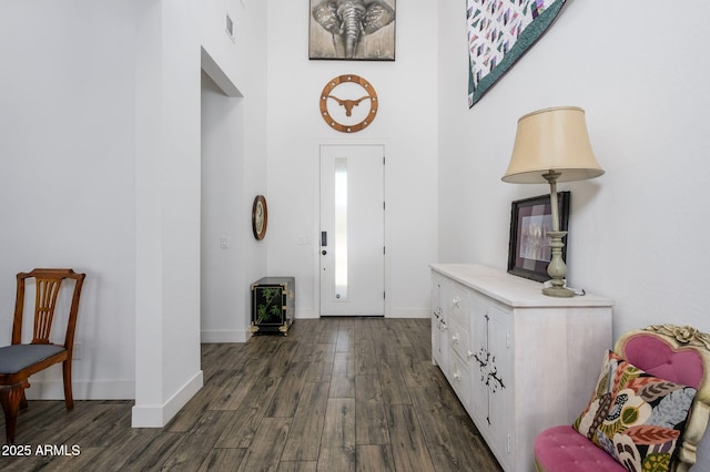 1221 E Paseo Way, Phoenix, AZ 85042 - entrance foyer featuring dark wood-type flooring and baseboards