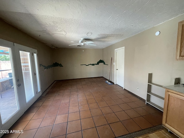 1529 W Eva St, Phoenix, AZ 85021 - unfurnished room featuring a textured ceiling, ceiling fan, and tile patterned floors
