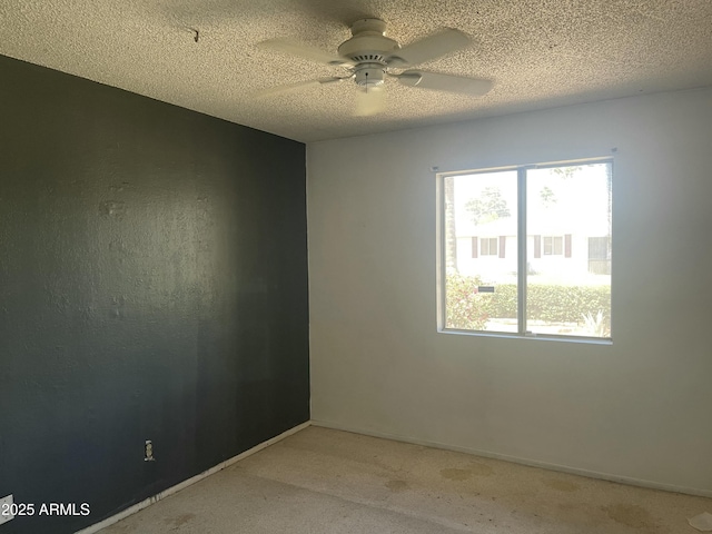 1529 W Eva St, Phoenix, AZ 85021 - empty room featuring light colored carpet, a ceiling fan, a textured ceiling, and baseboards