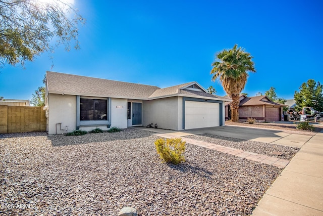 single story home with a garage