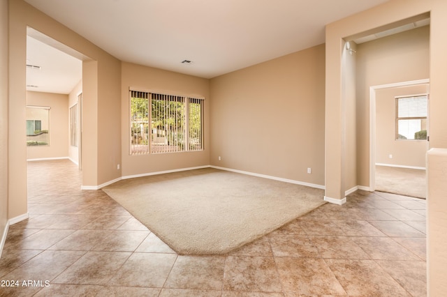 view of carpeted spare room