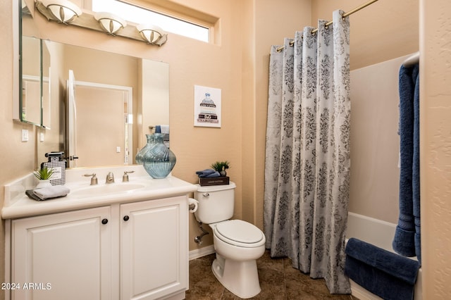 full bathroom featuring vanity, toilet, tile patterned flooring, and shower / bath combo with shower curtain