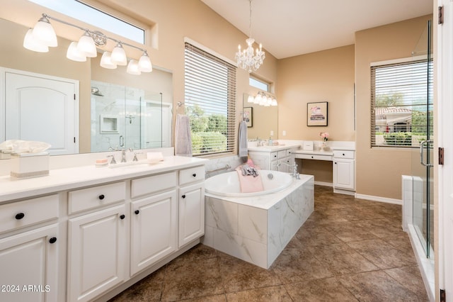 bathroom featuring vanity, shower with separate bathtub, and an inviting chandelier