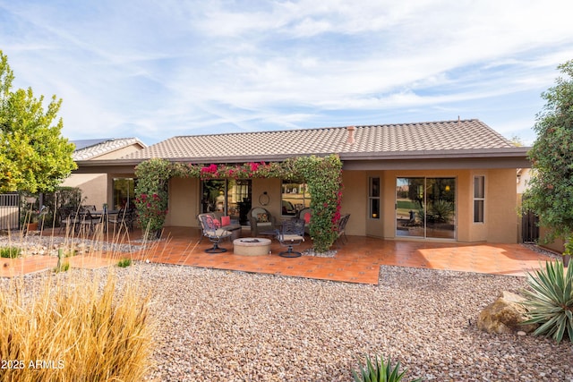 rear view of property with a patio