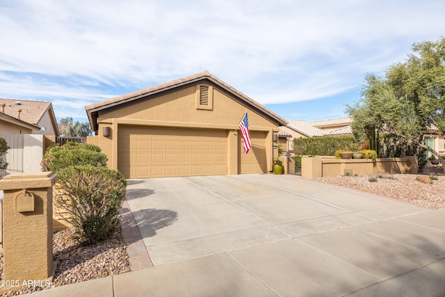 view of front of home with a garage