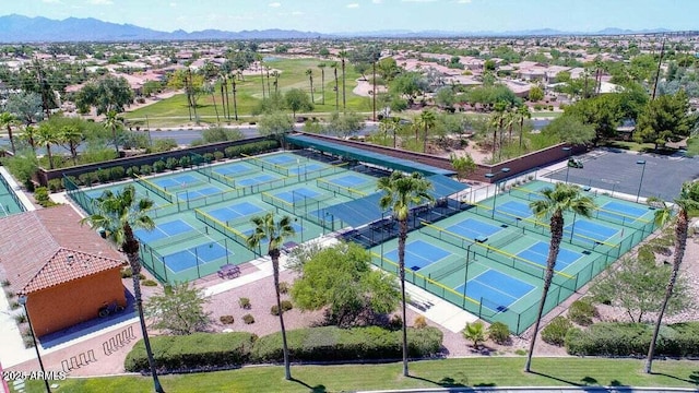 birds eye view of property with a mountain view