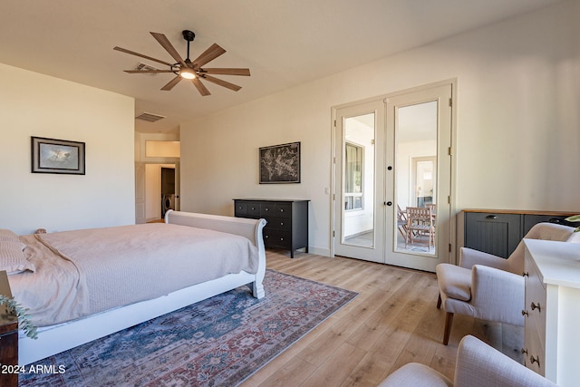 bedroom featuring french doors, ceiling fan, access to outside, and light hardwood / wood-style flooring