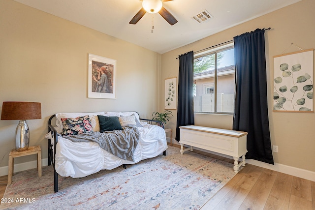 bedroom featuring ceiling fan and wood-type flooring