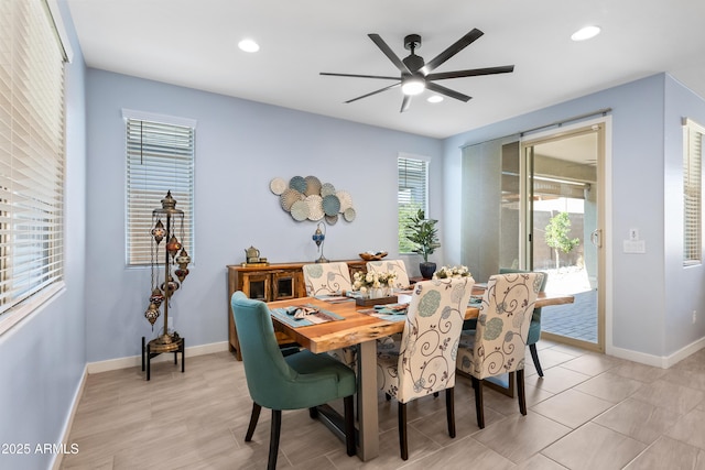 dining room featuring ceiling fan