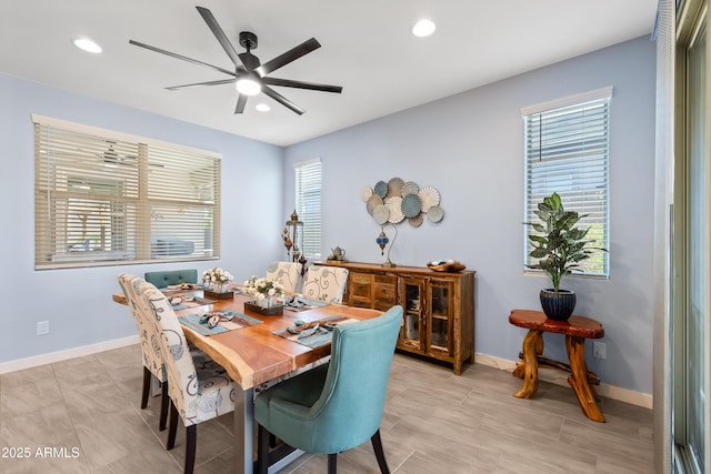 dining room featuring ceiling fan