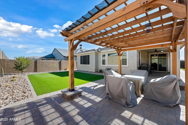 view of patio featuring a pergola, grilling area, and ceiling fan