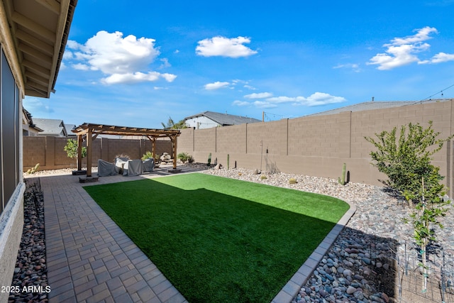 view of yard with a pergola and a patio