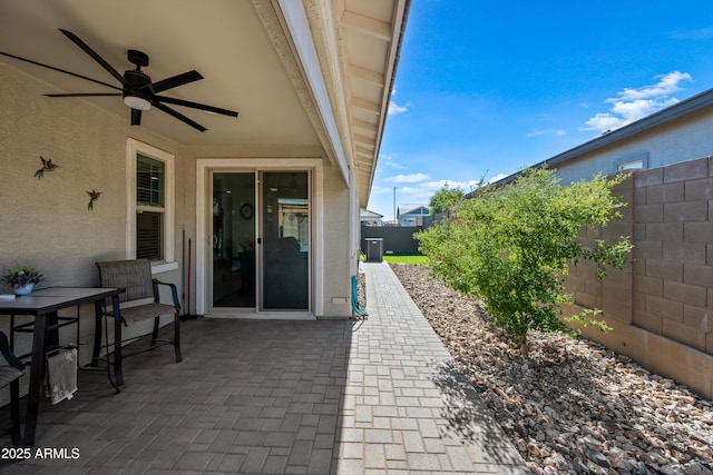 view of patio featuring ceiling fan