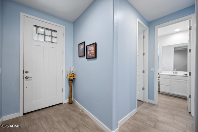 foyer featuring sink