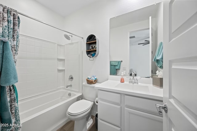 full bathroom with toilet, vanity, and washtub / shower combination