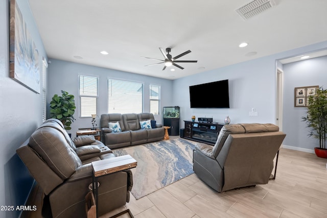 living room featuring ceiling fan